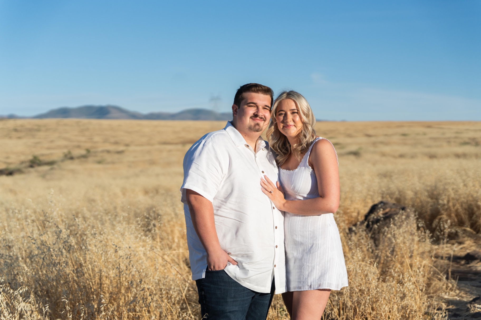 Molly and Noah walking together through the Arizona desert